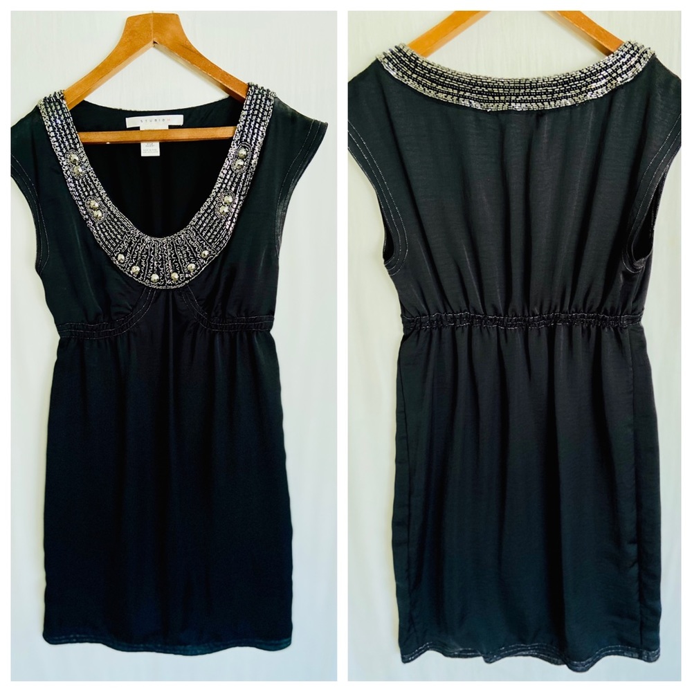 Black, knee length cocktail dress, size medium
